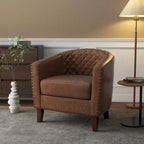 Sillón moderno de polipiel con ribete de tachuelas y giratorio