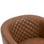 Sillón moderno de polipiel con ribete de tachuelas y giratorio
