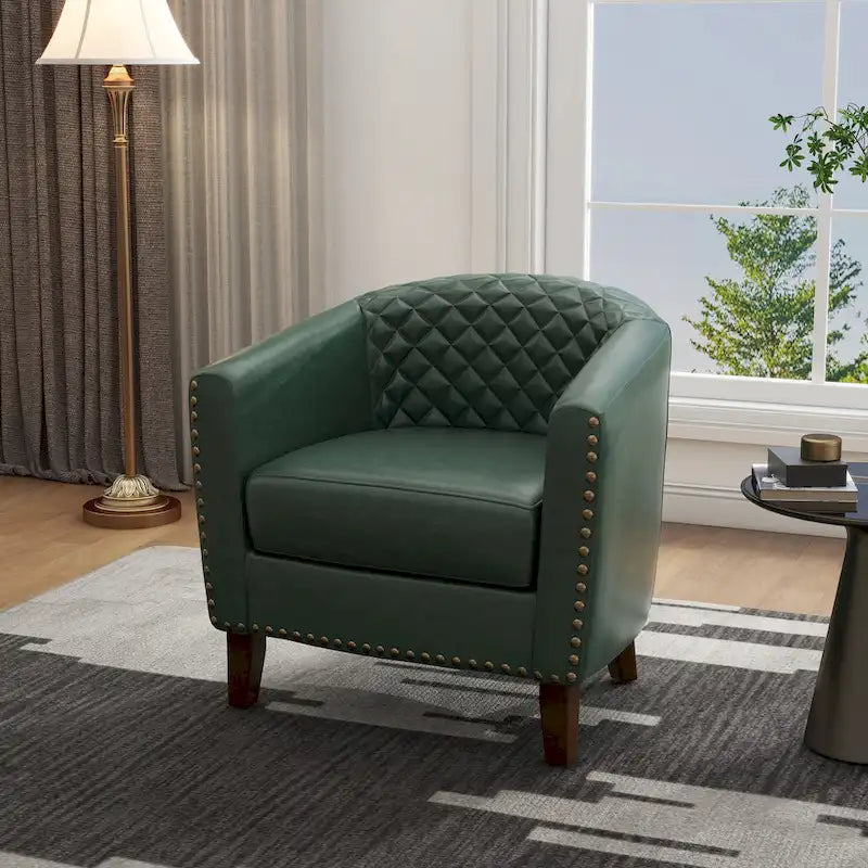 Sillón moderno de polipiel con ribete de tachuelas y giratorio